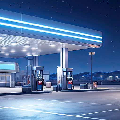 An illustration of a gas station at night