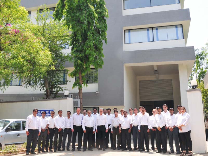 The team celebrate the opening of the new headquarters at Pune with Philipp Bayat (CEO) 