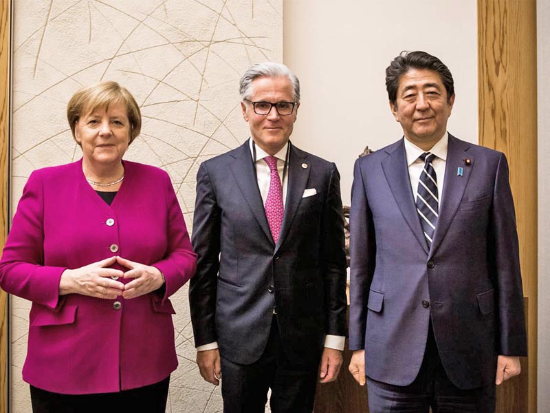 Chancellor Angela Merkel, Philipp Bayat, Prime Minister Shinzō Abe 