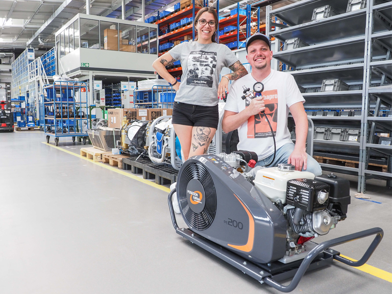 Patricia and Tobias receiving their brandnew PE TB 200 mobile compressor 
