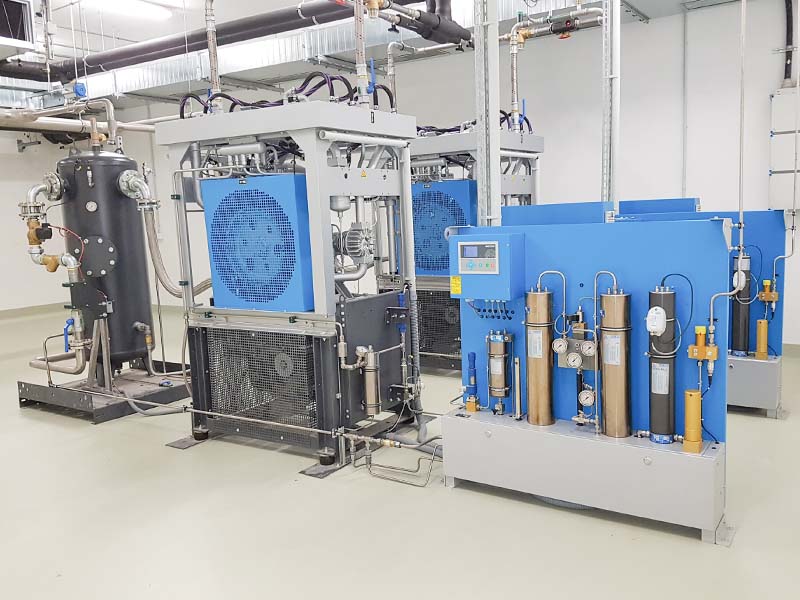  Two advanced GB 23.2 rare gas compressors operate as an interconnected unit to compress the costly helium recovered during measurement